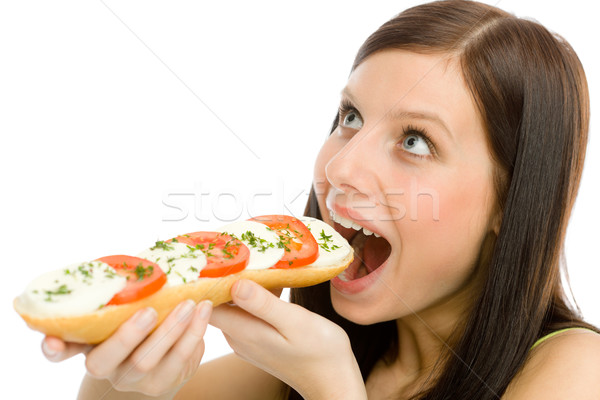 Vrouw eten caprese sandwich portret Stockfoto © CandyboxPhoto