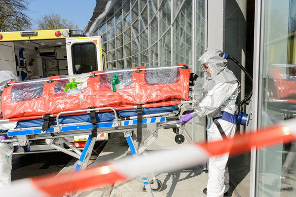 Biohazard medical team member with stretcher Stock photo © CandyboxPhoto