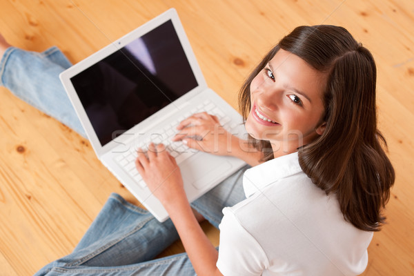 Young female teenager with laptop sitting  Stock photo © CandyboxPhoto