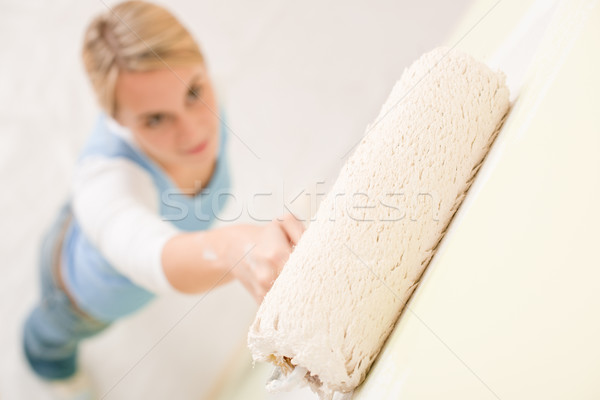 Home improvement - handywoman painting wall Stock photo © CandyboxPhoto