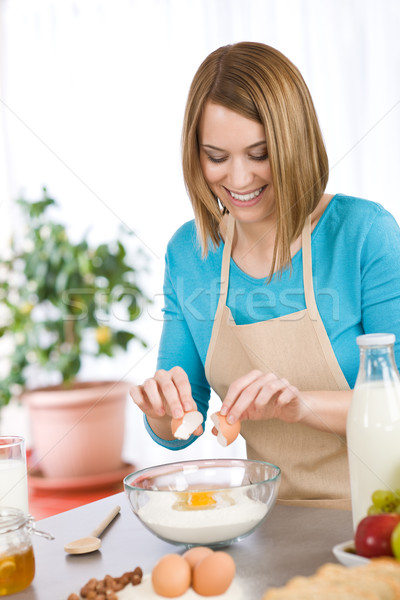 Stock photo: Baking - Smiling woman with healthy ingredients