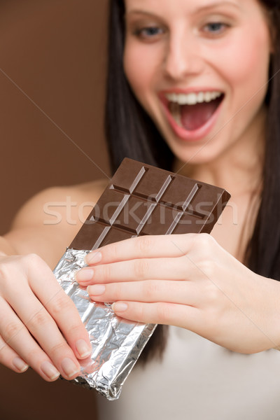 Chocolate - portrait young woman bite sweets Stock photo © CandyboxPhoto