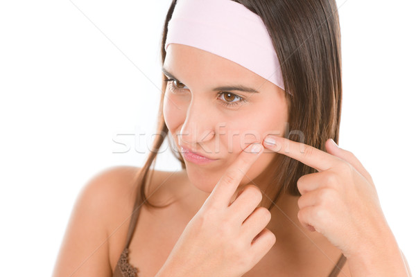 Teenager problem skin care - squeeze pimple Stock photo © CandyboxPhoto