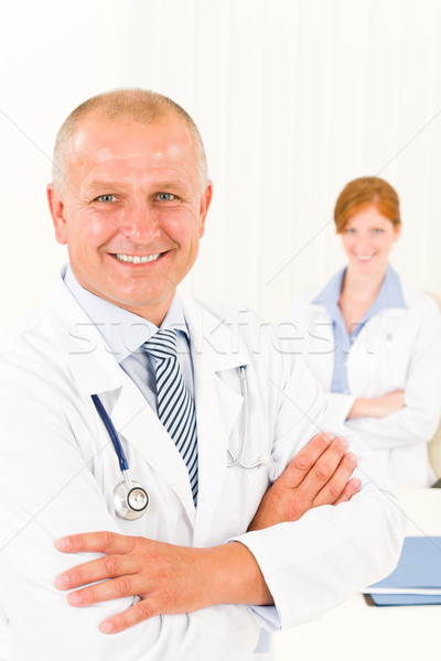 Medical team senior smiling male young woman Stock photo © CandyboxPhoto