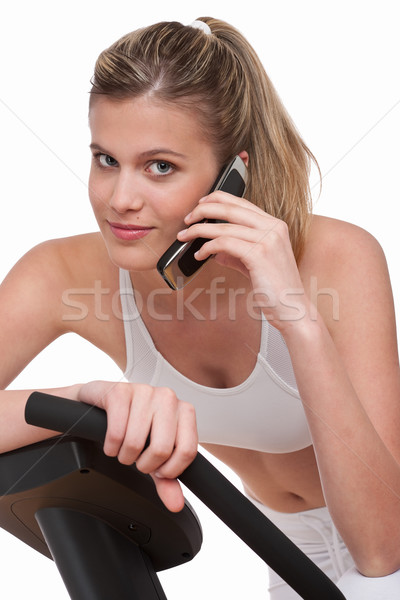 Fitness vrouw mobiele telefoon witte meisje sport Stockfoto © CandyboxPhoto