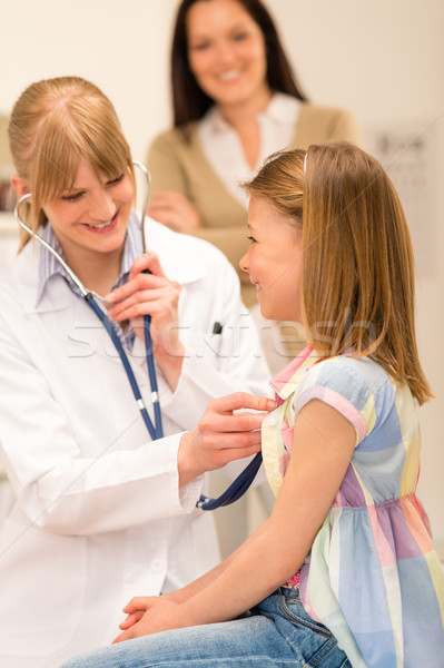 Pediatrician examine girl chest with stethoscope Stock photo © CandyboxPhoto