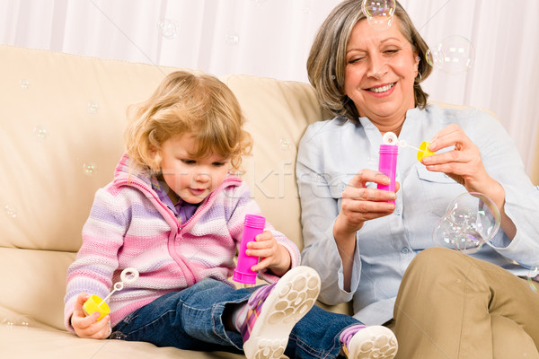 Kleines Mädchen Großmutter spielen Blase Gebläse wenig Stock foto © CandyboxPhoto