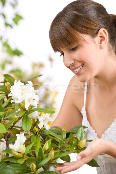 Gardening - Portrait of woman with Rhododendron flower Stock photo © CandyboxPhoto