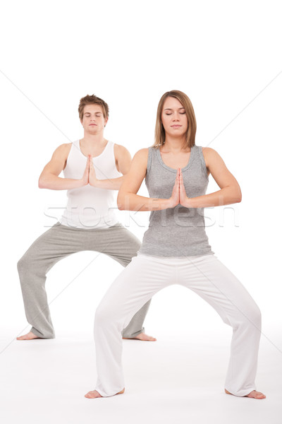 Fitness - Young healthy couple in yoga position Stock photo © CandyboxPhoto