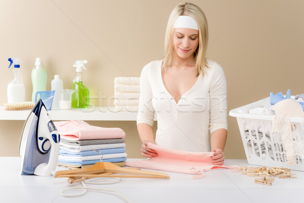 Laundry ironing - woman folding clothes Stock photo © CandyboxPhoto
