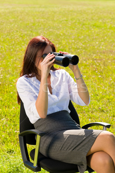 Businesswoman sit in sunny meadow seek binocular Stock photo © CandyboxPhoto