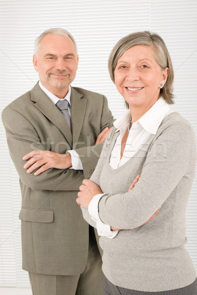 Senior businesspeople smile cross arms portrait Stock photo © CandyboxPhoto