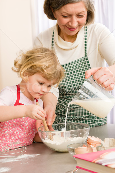 Grandmother and granddaughter baking cookies Stock photo © CandyboxPhoto