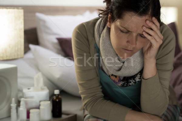 Ill woman with medicines suffer flu headache Stock photo © CandyboxPhoto