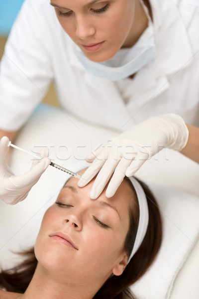 Stock photo: Botox injection - Woman in cosmetic medicine treatment