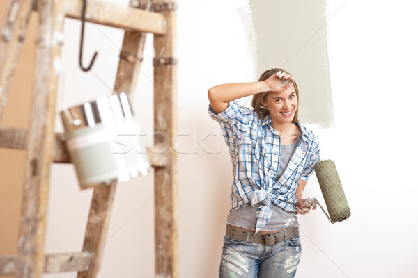 Amélioration de l'habitat blond femme peinture mur peinture [[stock_photo]] © CandyboxPhoto