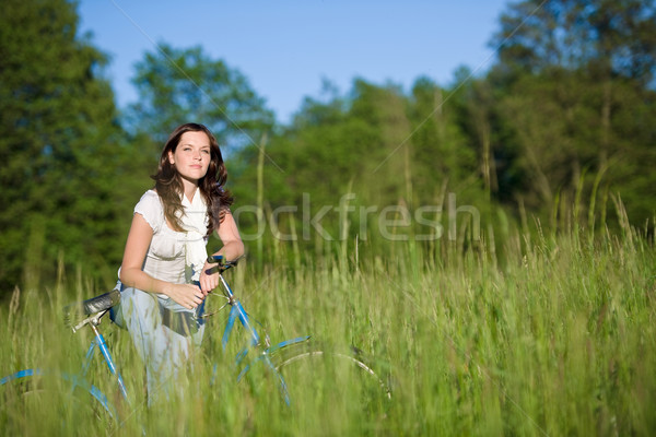 Woman with old-fashioned bike in summer meadow  Stock photo © CandyboxPhoto