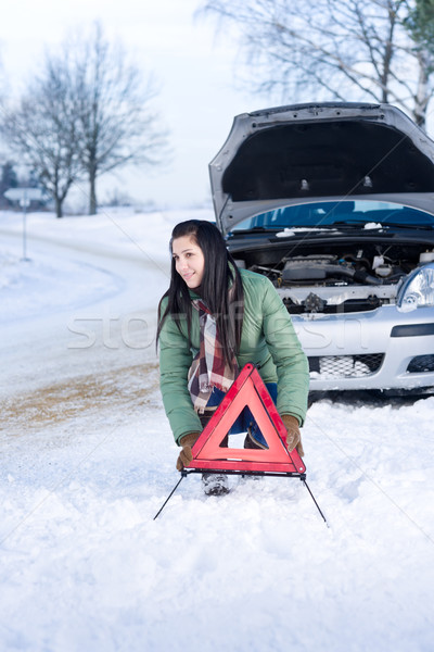 Winter car breakdown - woman warning triangle Stock photo © CandyboxPhoto