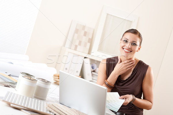 Smiling interior designer with color swatch at office Stock photo © CandyboxPhoto