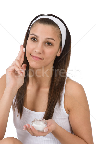 Beauty facial care - Young woman apply moisturizer  Stock photo © CandyboxPhoto