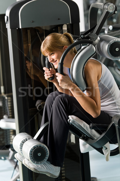 Jonge vrouw fitness centrum oefening abdominaal spier Stockfoto © CandyboxPhoto