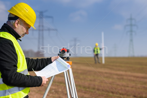 Geodesist measure land on construction site Stock photo © CandyboxPhoto