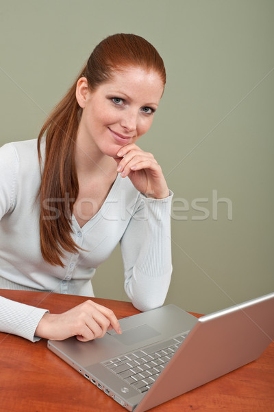 Stock photo: Long red hair business woman at office 