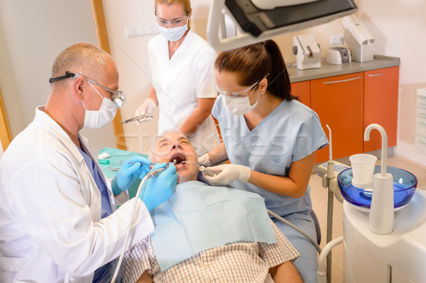 Senior man at dentist surgery have treatment Stock photo © CandyboxPhoto