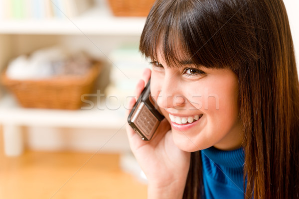 [[stock_photo]]: Adolescent · fille · détendre · maison · téléphone · heureux