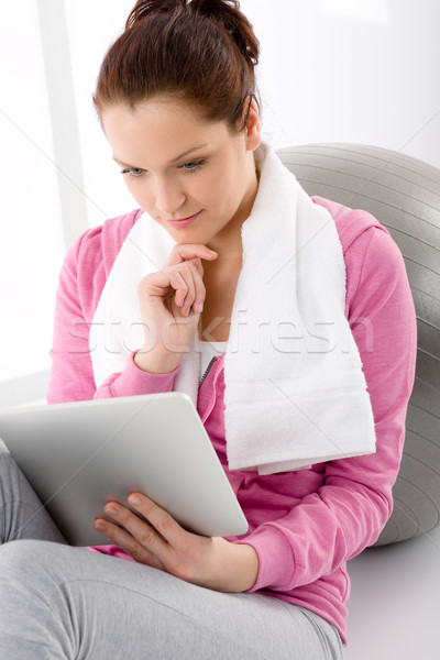 Woman touch screen computer fitness outfit Stock photo © CandyboxPhoto