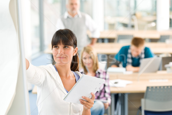 High school - three students with mature professor Stock photo © CandyboxPhoto