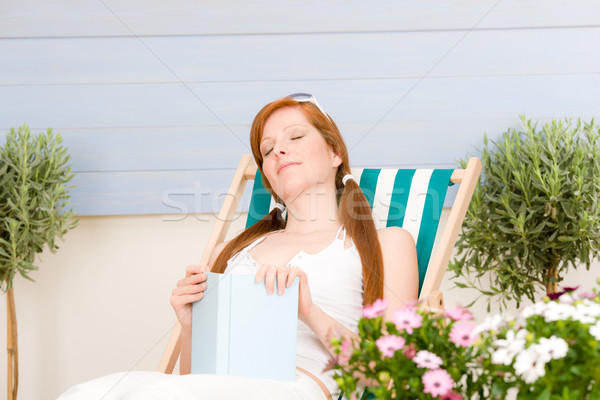 Summer terrace red hair woman relax in deckchair Stock photo © CandyboxPhoto