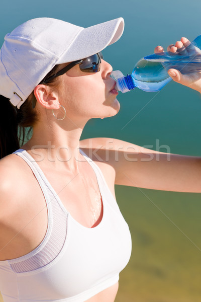 Summer sport fit woman drink water bottle Stock photo © CandyboxPhoto