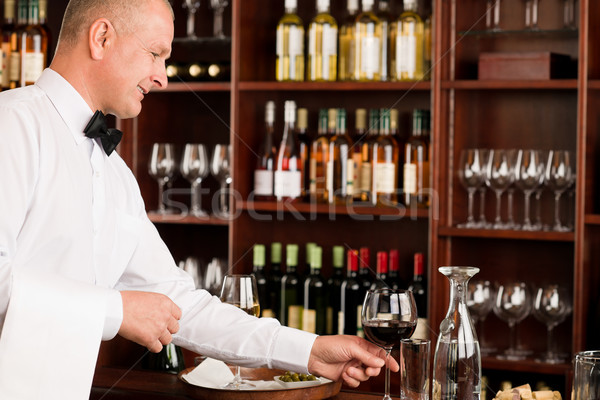 Wine bar waiter mature serve glass restaurant Stock photo © CandyboxPhoto