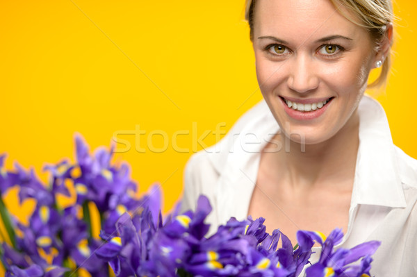 Gülümseyen kadın bahar mor iris mavi çiçekler Stok fotoğraf © CandyboxPhoto