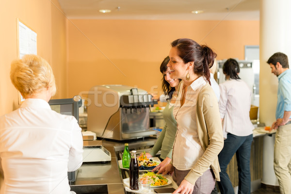 Cafeteria pay at cashier women in queue Stock photo © CandyboxPhoto