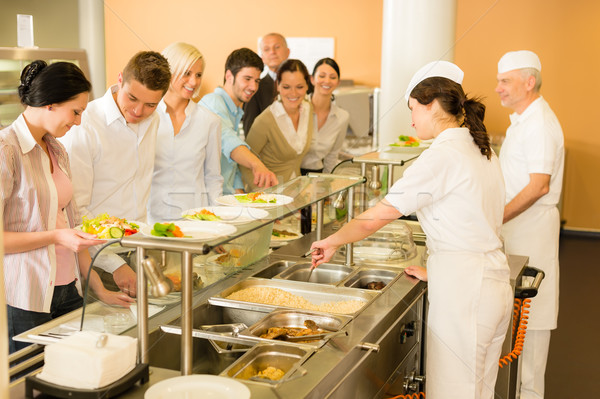 Office woman in canteen cook serve meals Stock photo © CandyboxPhoto