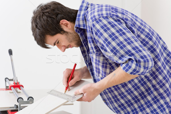 Home improvement - handyman cut tile Stock photo © CandyboxPhoto