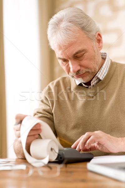 Senior mature man - home office with calculator Stock photo © CandyboxPhoto