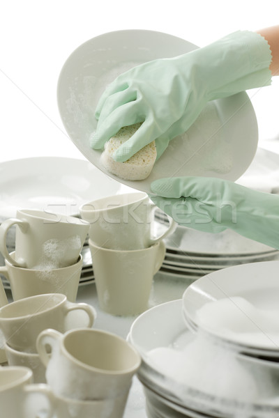 Сток-фото: мытье · посуды · рук · перчатки · кухне · работа · по · дому · стороны