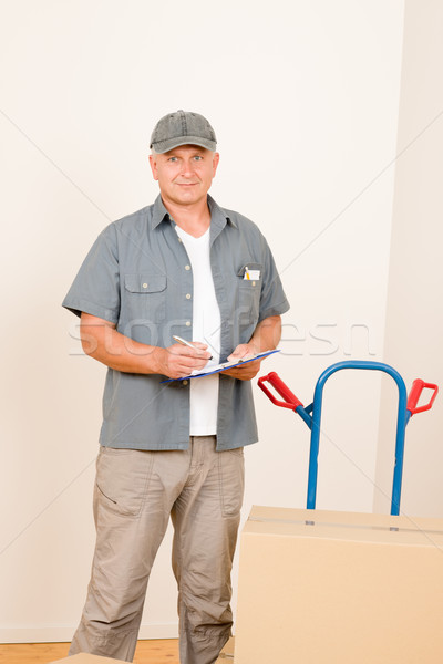 Messenger mature male courier delivering parcels Stock photo © CandyboxPhoto
