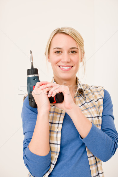 Home improvement vrouw batterij schroevendraaier gelukkig Stockfoto © CandyboxPhoto