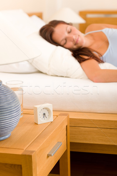 Alarm clock Woman sleeping in white bed Stock photo © CandyboxPhoto