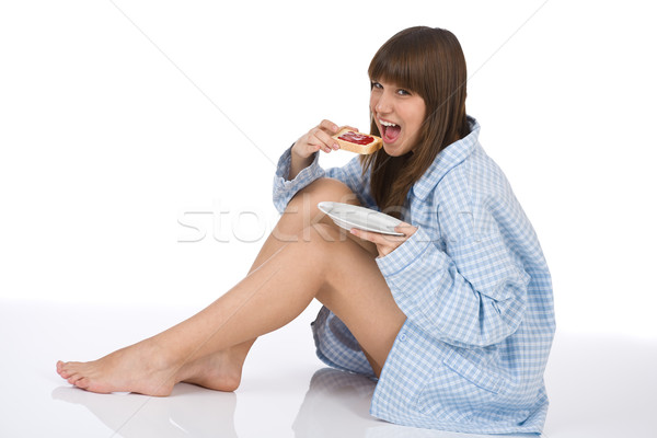 Stok fotoğraf: Mutlu · genç · sağlıklı · beslenme · tost · kahvaltı · pijama