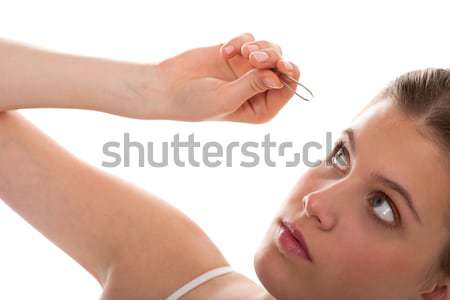 Body care series - Young woman using tweezers Stock photo © CandyboxPhoto
