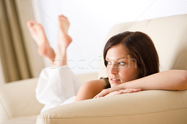 женщину расслабиться Lounge диван бежевый Сток-фото © CandyboxPhoto
