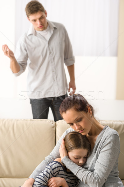 Mother protecting her daughter from angry father Stock photo © CandyboxPhoto