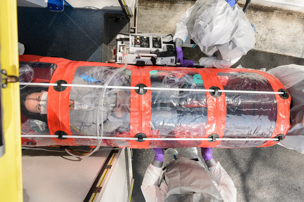 Contaminated patient on stretcher biohazard team Stock photo © CandyboxPhoto