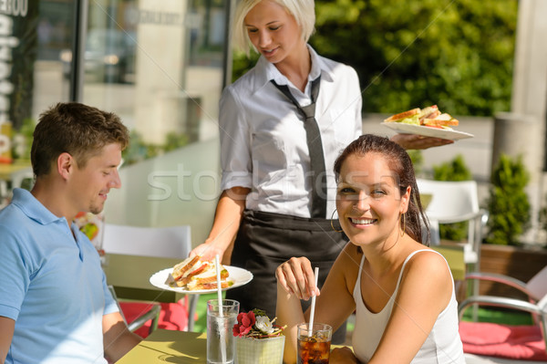 Waitress bring couple lunch food restaurant terrace Stock photo © CandyboxPhoto