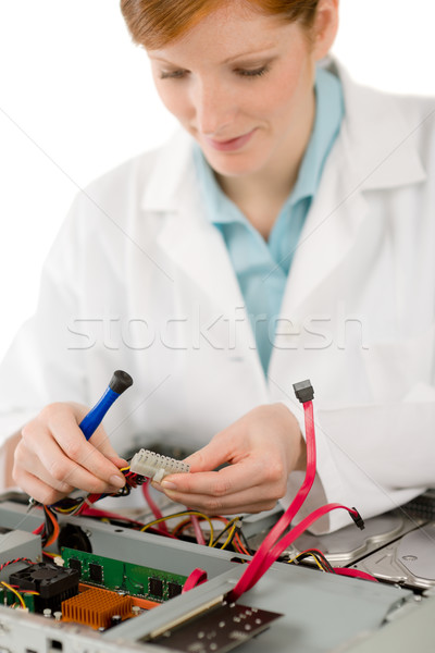 Stock photo: Female support computer engineer - woman repair
